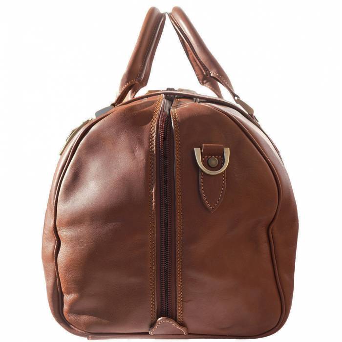 a brown purse with a cell phone inside of it 