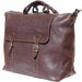 a brown purse sitting on top of a brown suitcase 