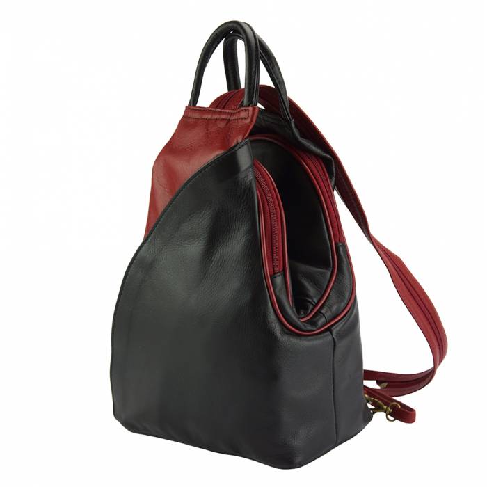 a backpack with a red purse on it 