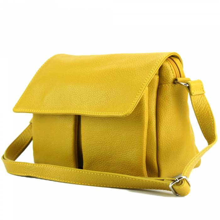 a yellow purse sitting on top of a yellow bag 