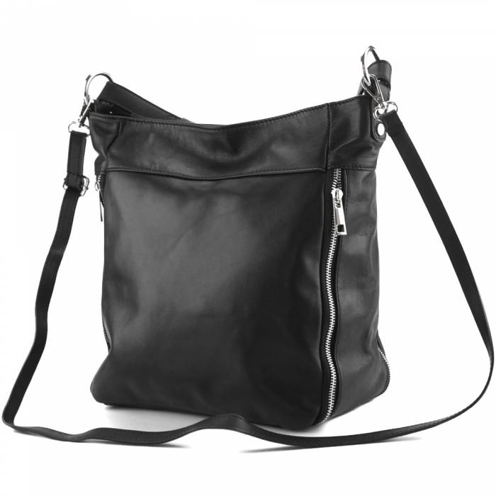 a black and white photo of a black purse 