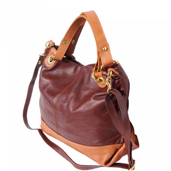 a brown purse with a purse on it 