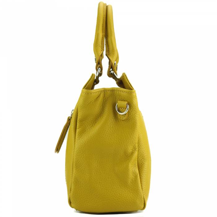 a yellow bag sitting on top of a table 